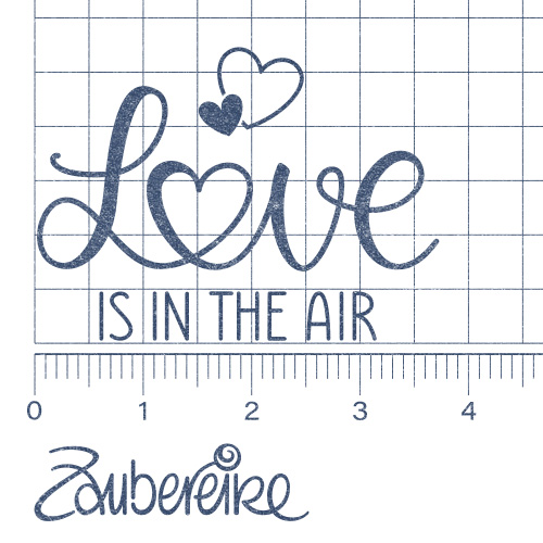 Textstempel "Love is in the air"